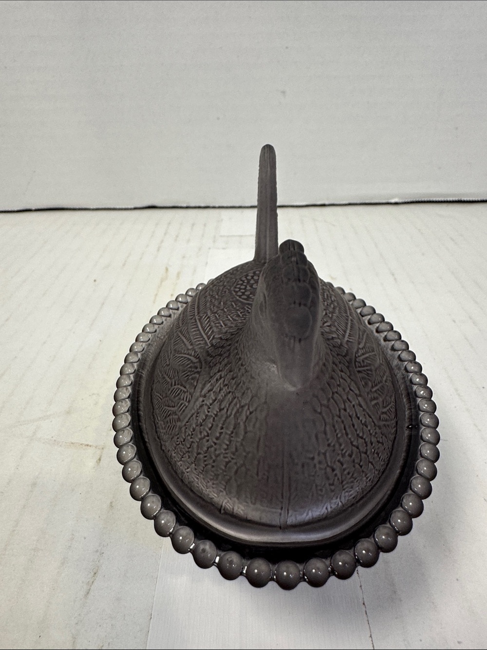 A grey glass chicken trinket Box with Beaded Rim